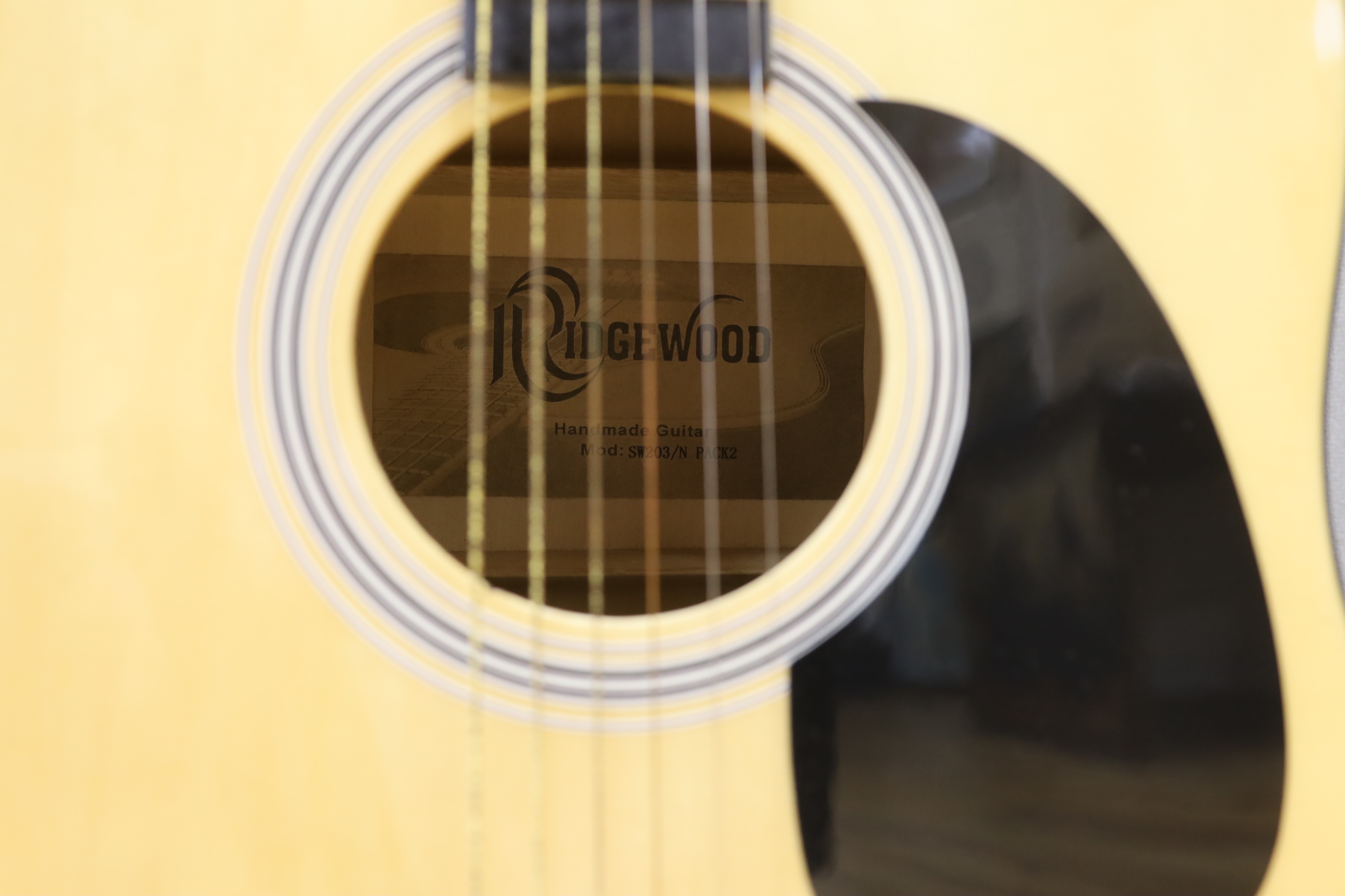 A Rockwood acoustic guitar, in a soft case